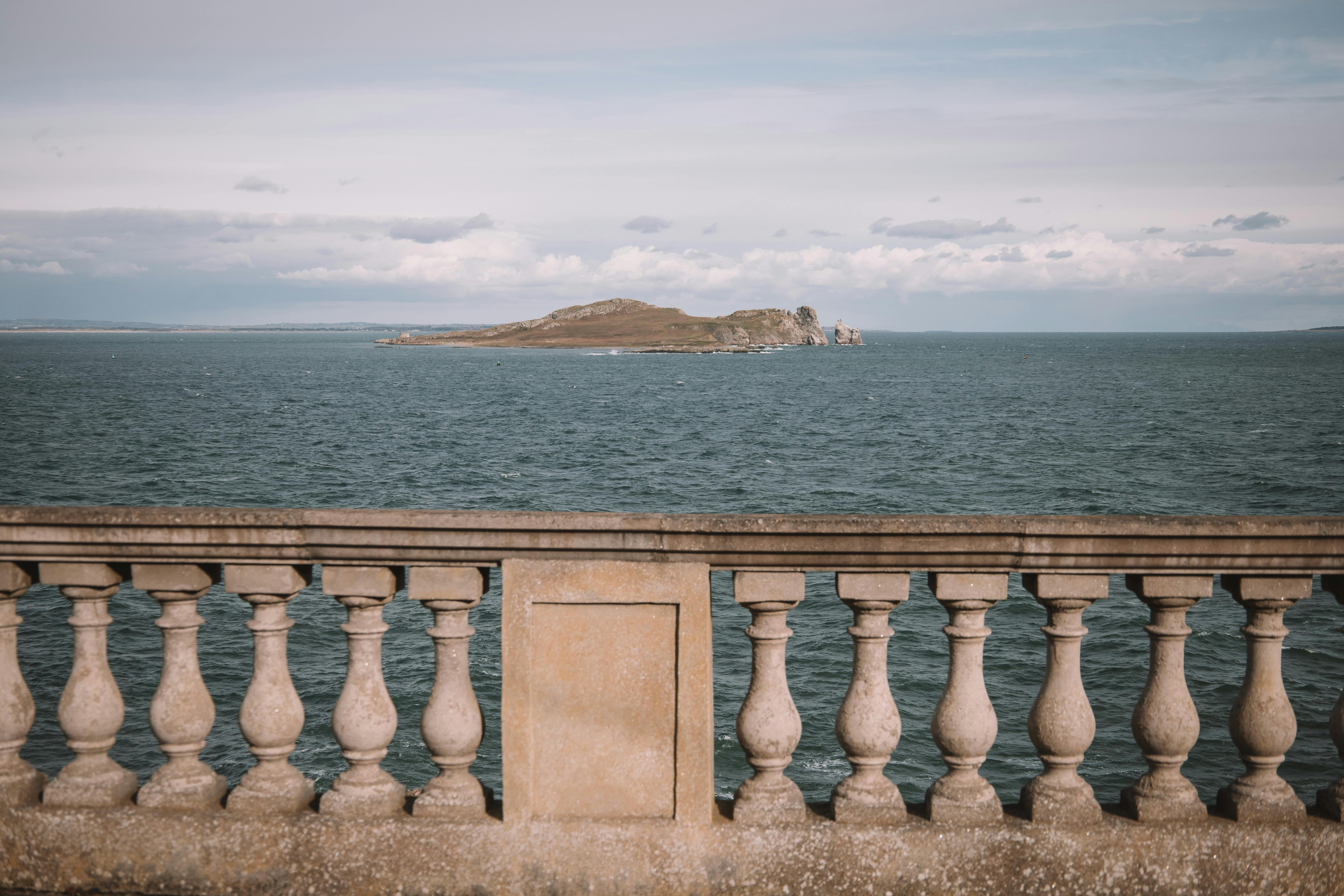 Stone Handrail at Boardwalk near Sea · Free Stock Photo