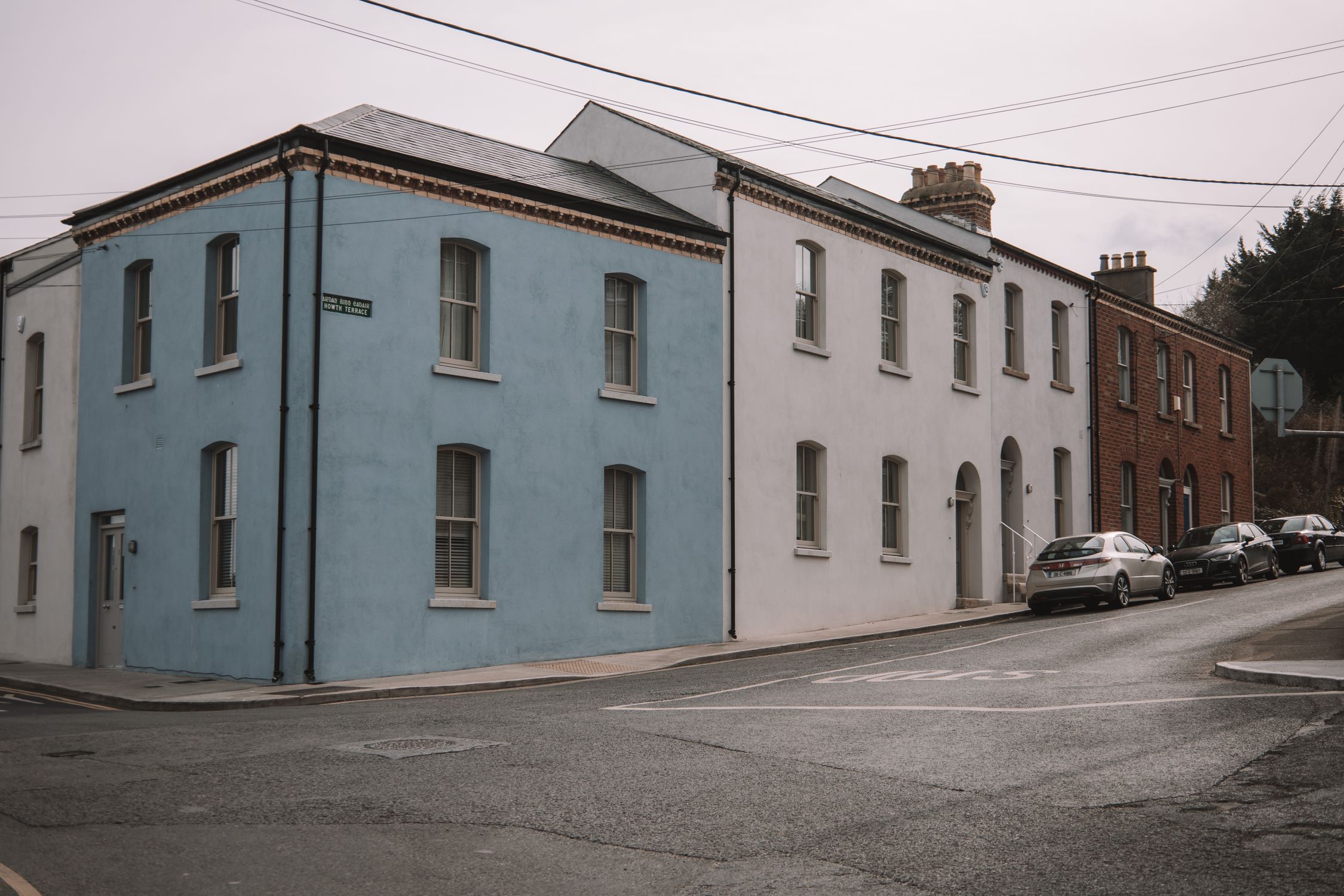 Vibrant scene of historic buildings and street life in Dublin, Ireland.