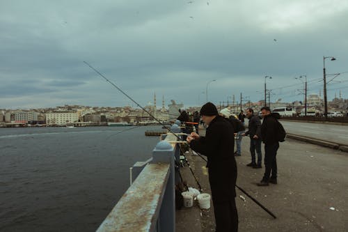 Men Fishing on the Bridge in Istanbul, Turkey 