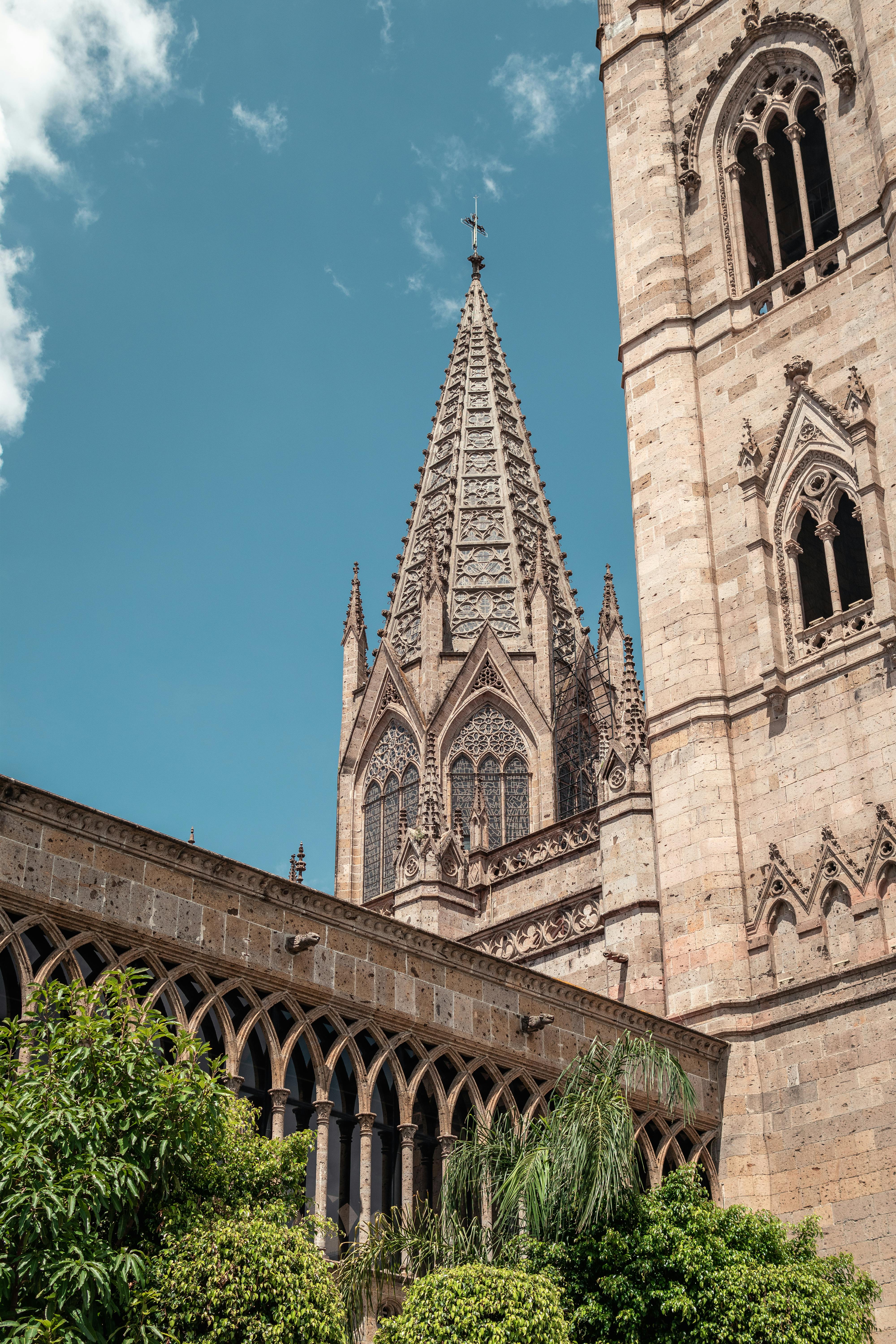 Stunning Gothic architecture of Guadalajara Cathedral against a clear blue sky.