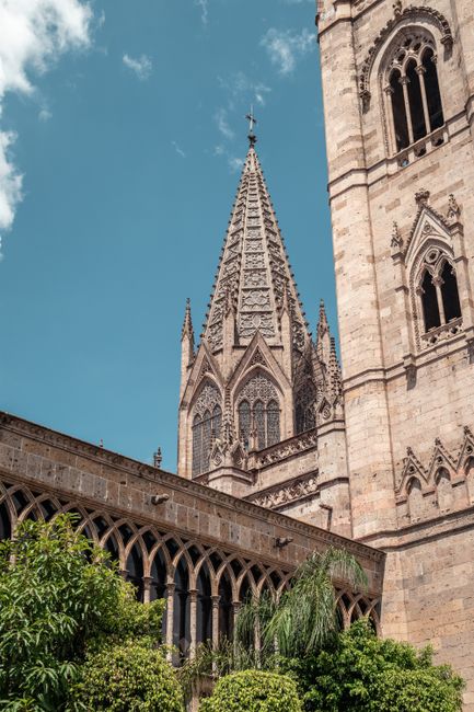 Stunning Gothic architecture of Guadalajara Cathedral against a clear blue sky.