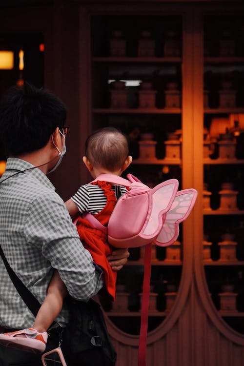 Father with Baby Daughter with Cute Backpack