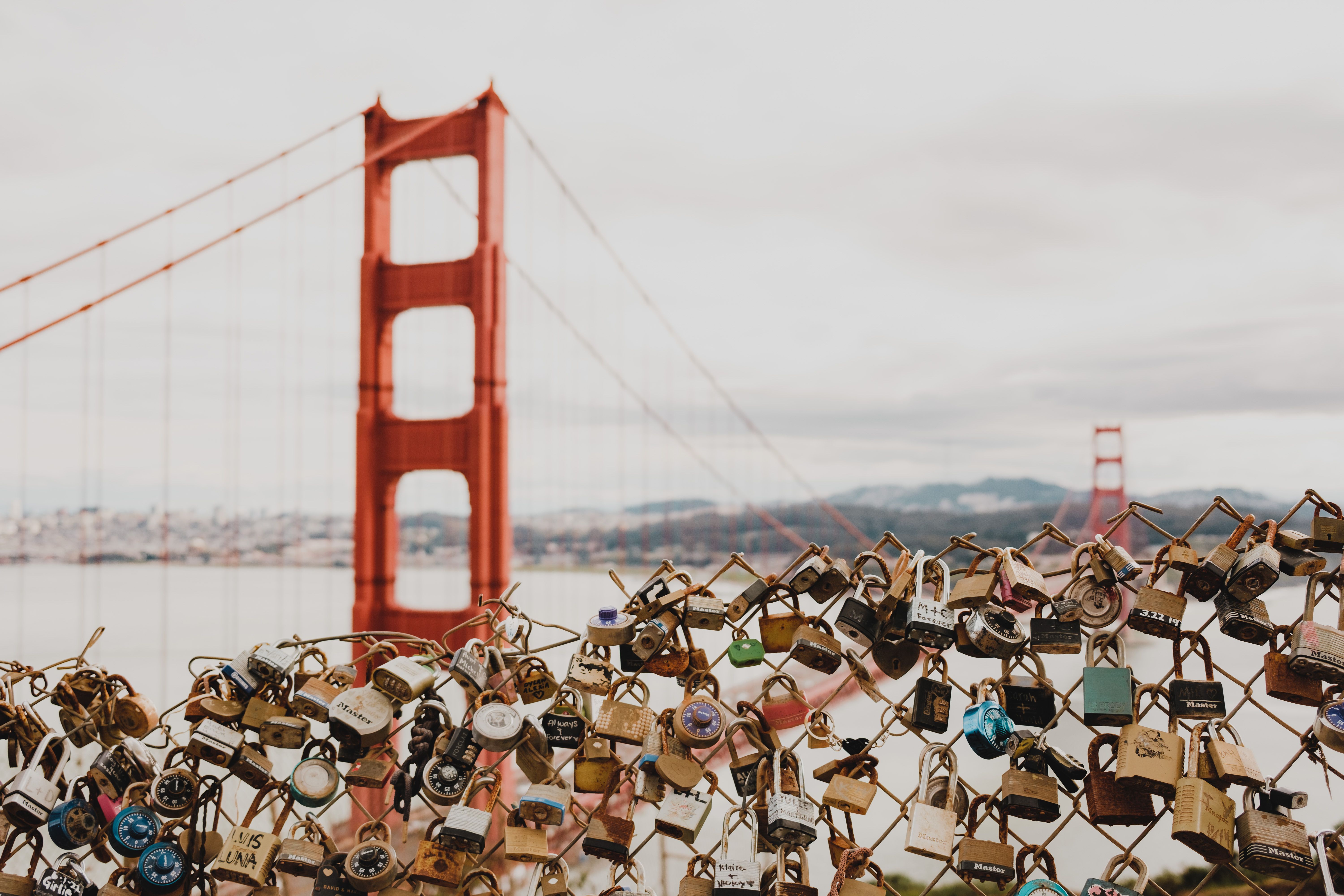 Red Suspension Bridge and Lockers Attached to a Net Fence · Free Stock ...