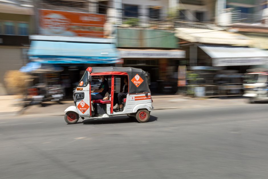 A Grab or PassApp tuk-tuk waiting for passengers in Siem Reap, Cambodia