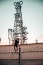 Person Standing on Steel Fence