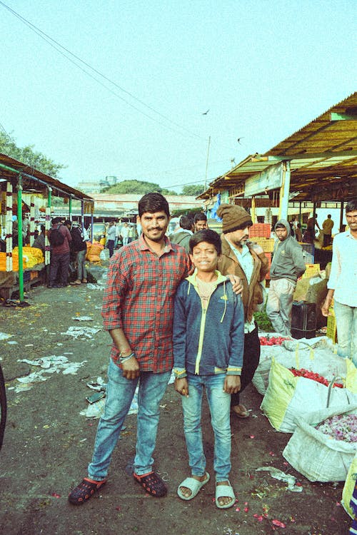 A Man with His Son on a Bazaar 