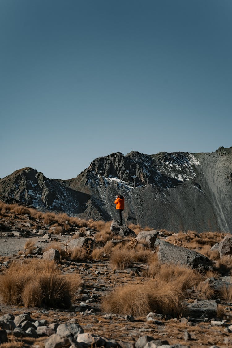 Man Hiking In Mountains