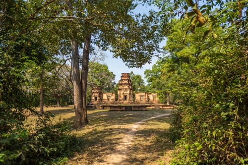 Free Explore the lush Cambodian jungle surrounding ancient temple ruins, a serene and historic retreat. Stock Photo