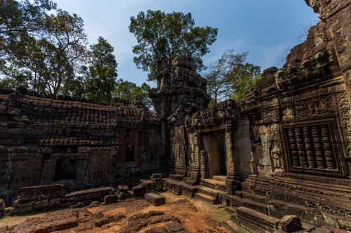 Free Explore the intricate carvings and historical architecture of ancient Cambodian temple ruins. Stock Photo