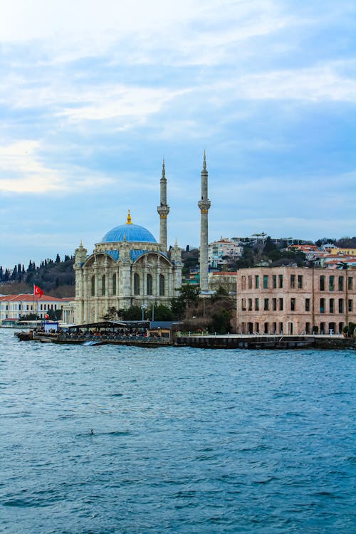 City Waterfront and a Mosque with Blue Dome 