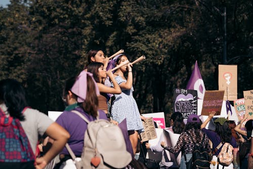 Free Women over Crowd at Manifestation Stock Photo