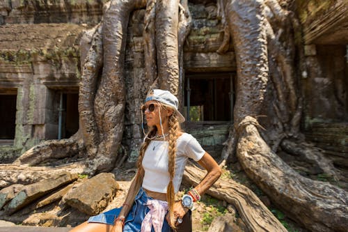 Woman Sightseeing the Ta Prohm Temple, Angkor Wat, Siem Reap, Cambodia 