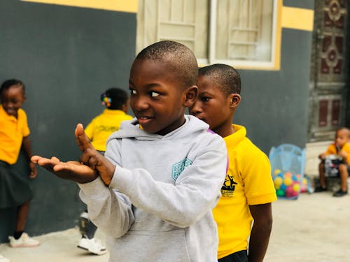 Boy Making Gesture