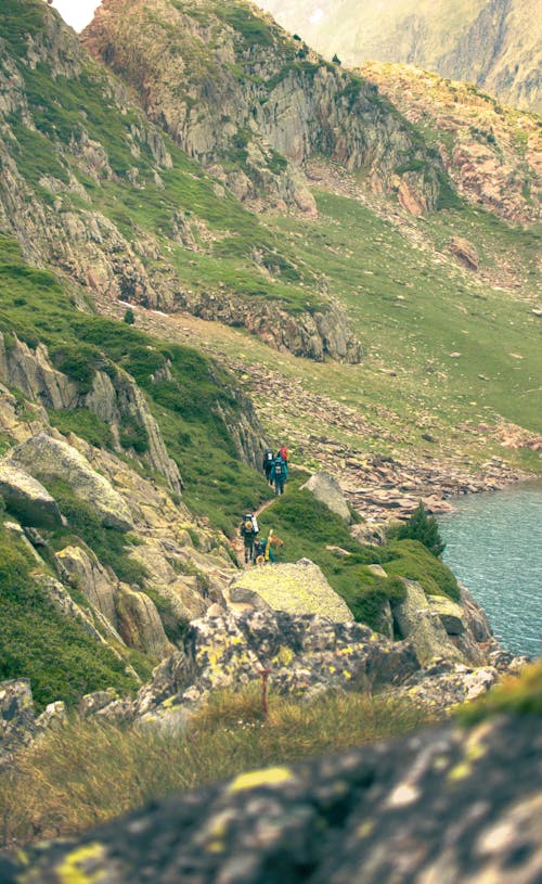 People Hiking in Mountains