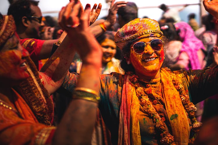 Crowd Of People Celebrating During The Holi Festival