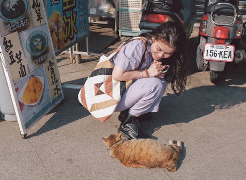 Smiling Girl with Cat