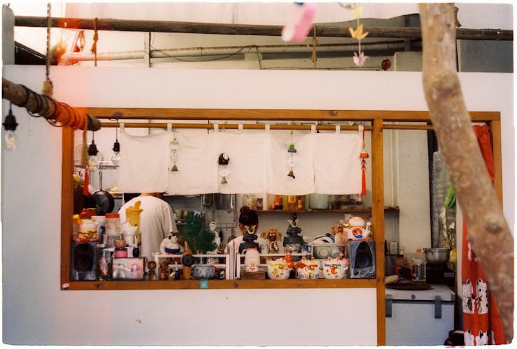 People Working In Bar Kitchen