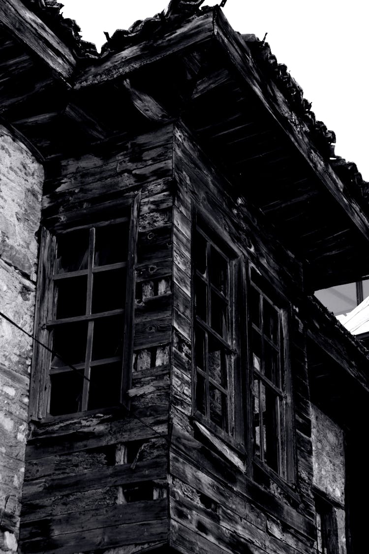 Abandoned Burnt Wooden House Facade