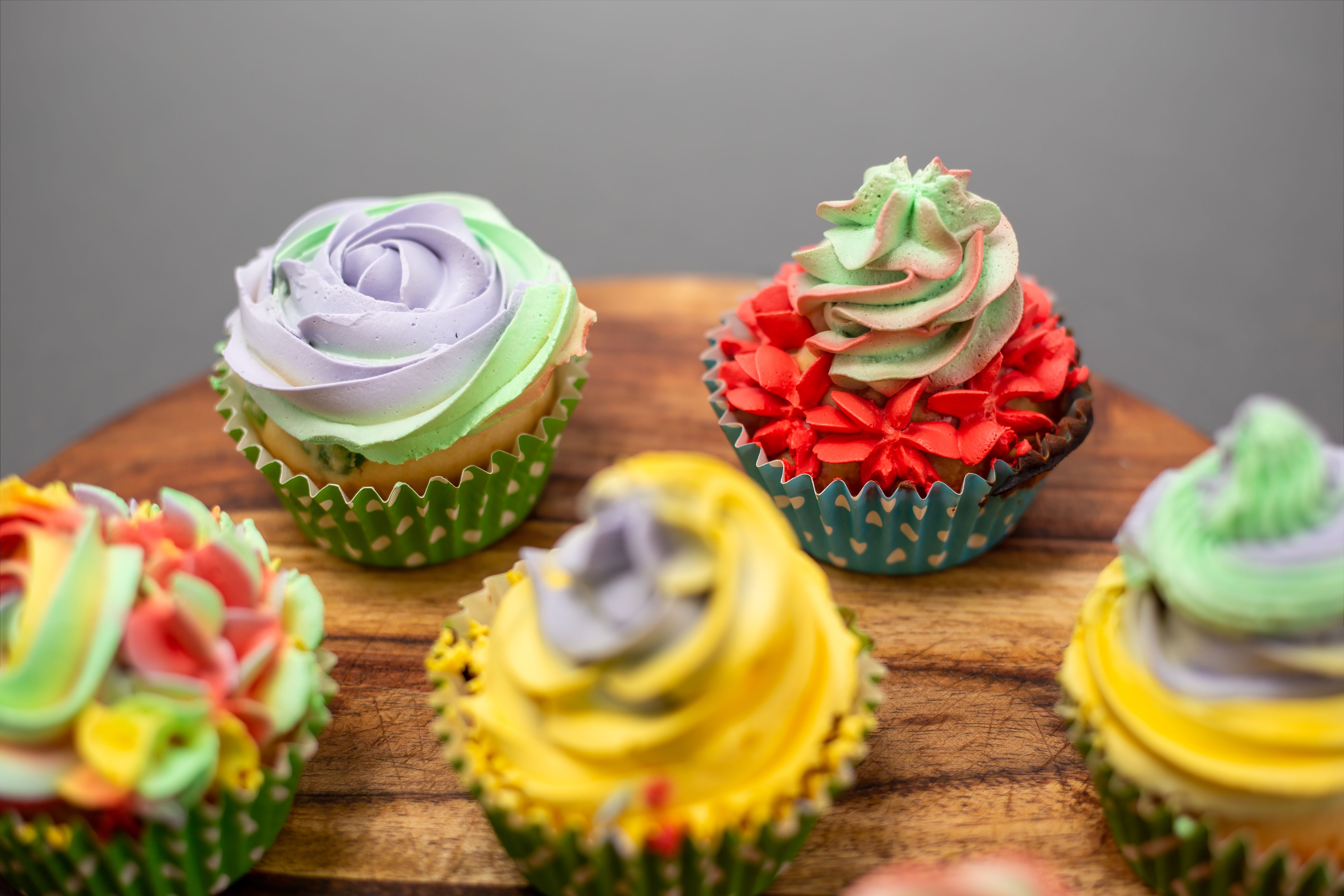 Colorful Cupcakes on a Wooden Tray 