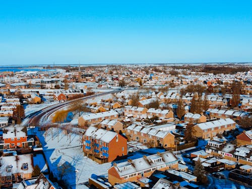 Kostnadsfri bild av hus, snö, stad