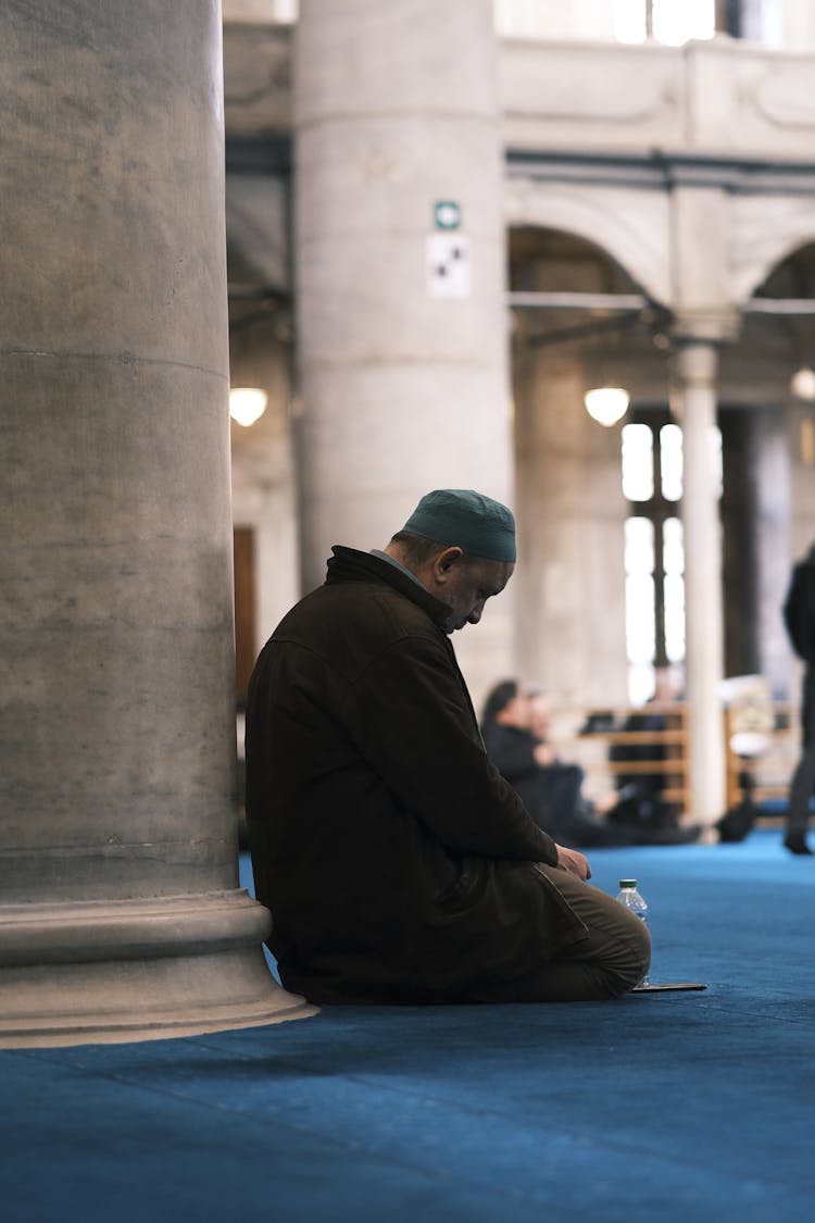 Man Praying In Mosque