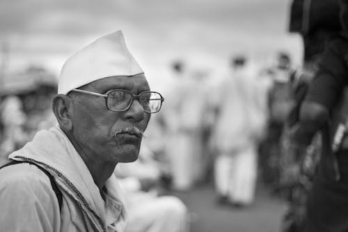 Man in Hat and Eyeglasses