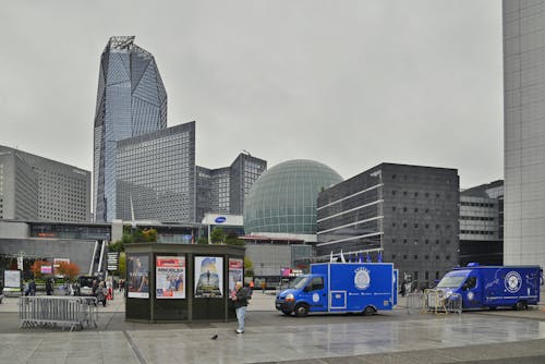   PARIS, FRANCE - October, 15, 2022 Defence Arch esplanade (La Defense) with view over modern office business steel and glass buildings and square in front of the arch with Popolo Street P...
