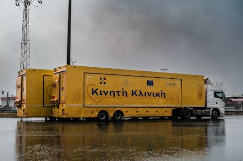 Kostnadsfri bild av frakt, gods, gul trailer