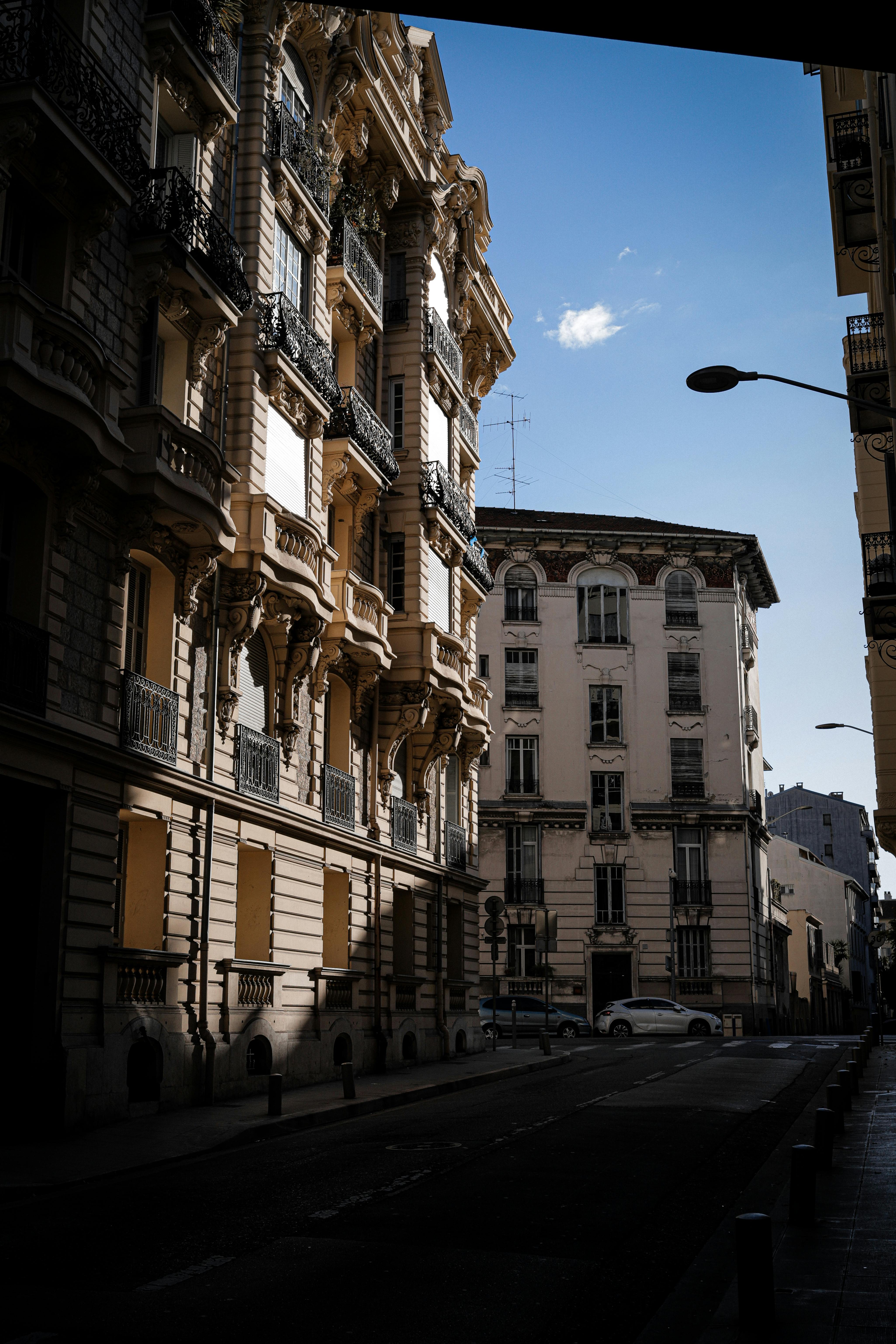 a street with buildings and a street light