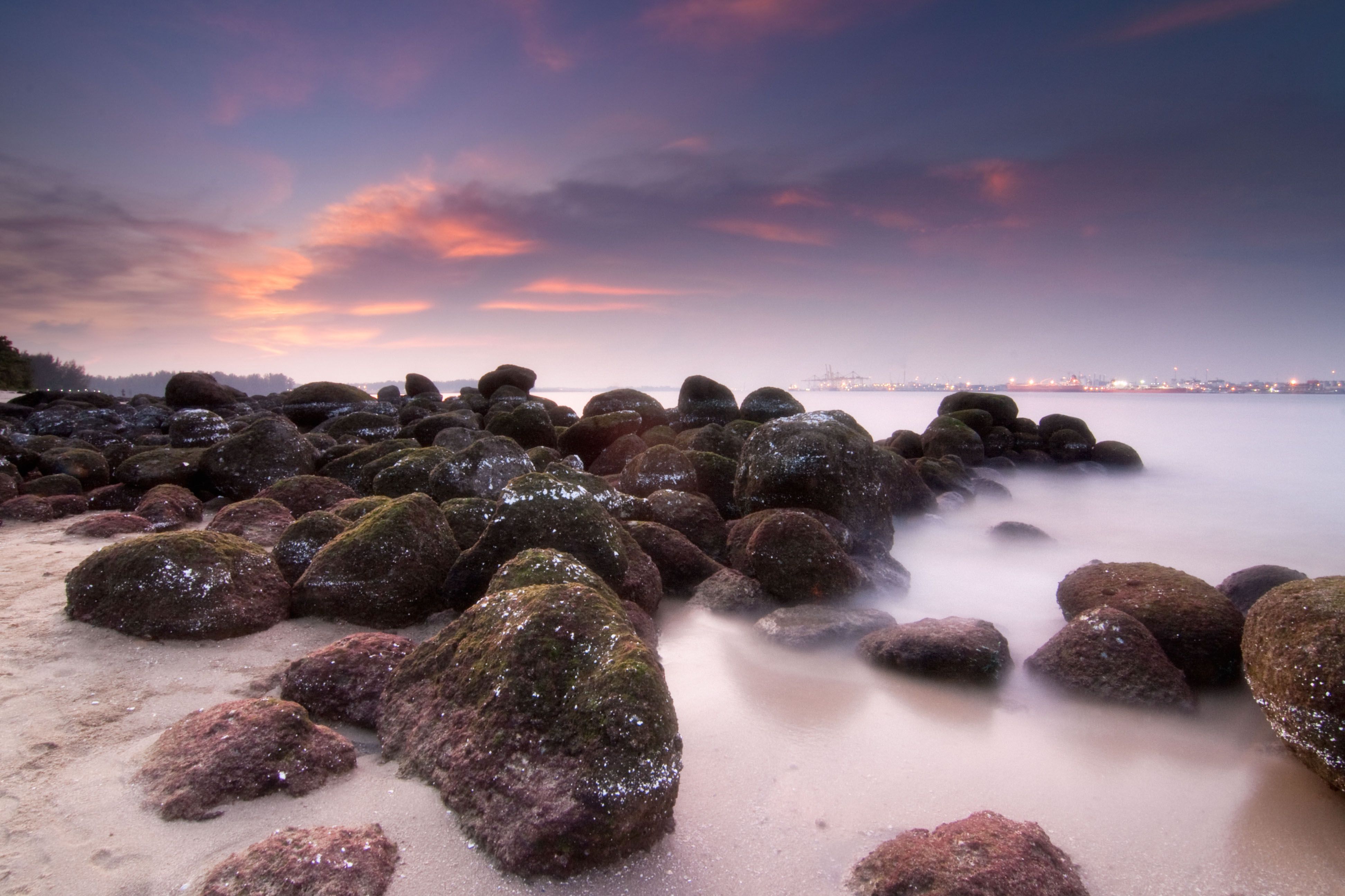 Blurred Sea and Rocks · Free Stock Photo