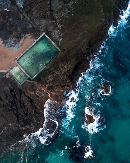 Ocean Water and Black Rock Formations