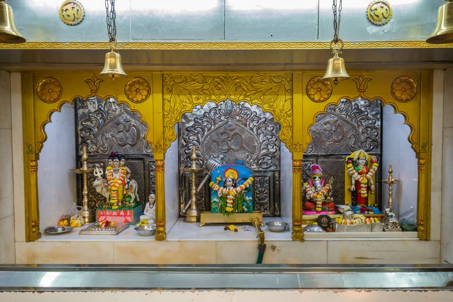 Real Hindu pooja shrine with decorative idols