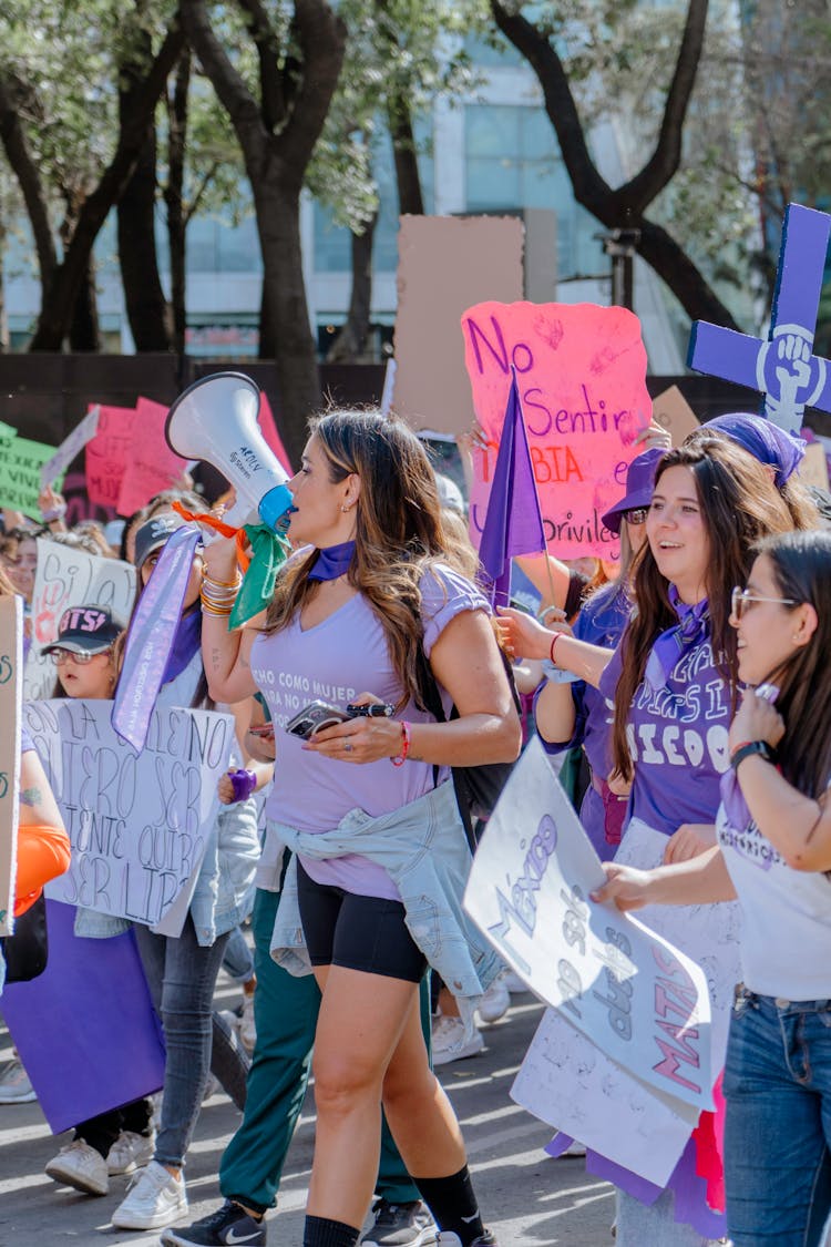 Protester With A Megaphone At The Head Of A Womens Rally