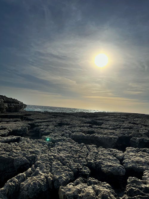 Photos gratuites de coucher de soleil sur la plage, paysage côtier