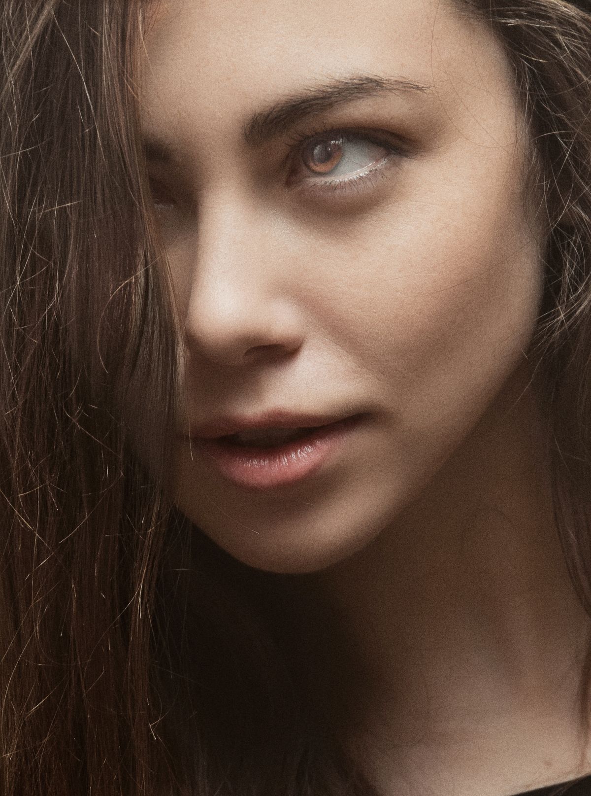 Portrait of a Beautiful Woman with Brown Eyes · Free Stock Photo