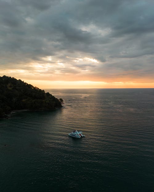 Luxury Yacht Anchored on the Ocean at Sunset