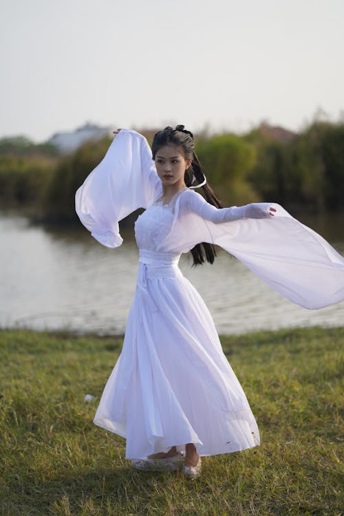 Brunette Model in White Dress