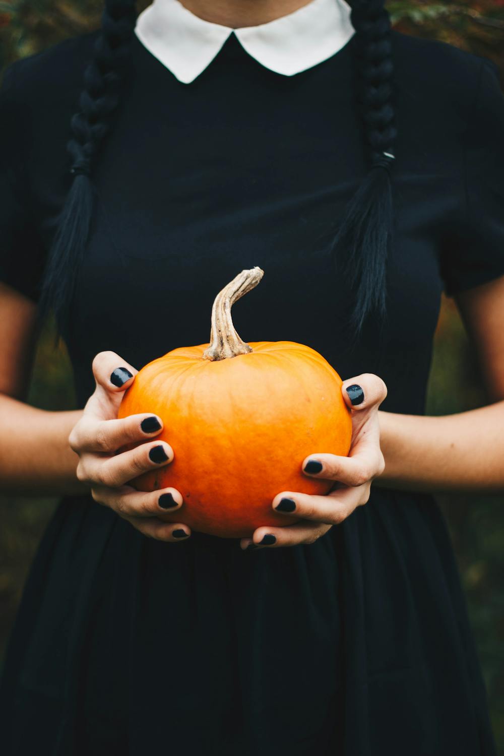 Girl Holding Pumpkin.