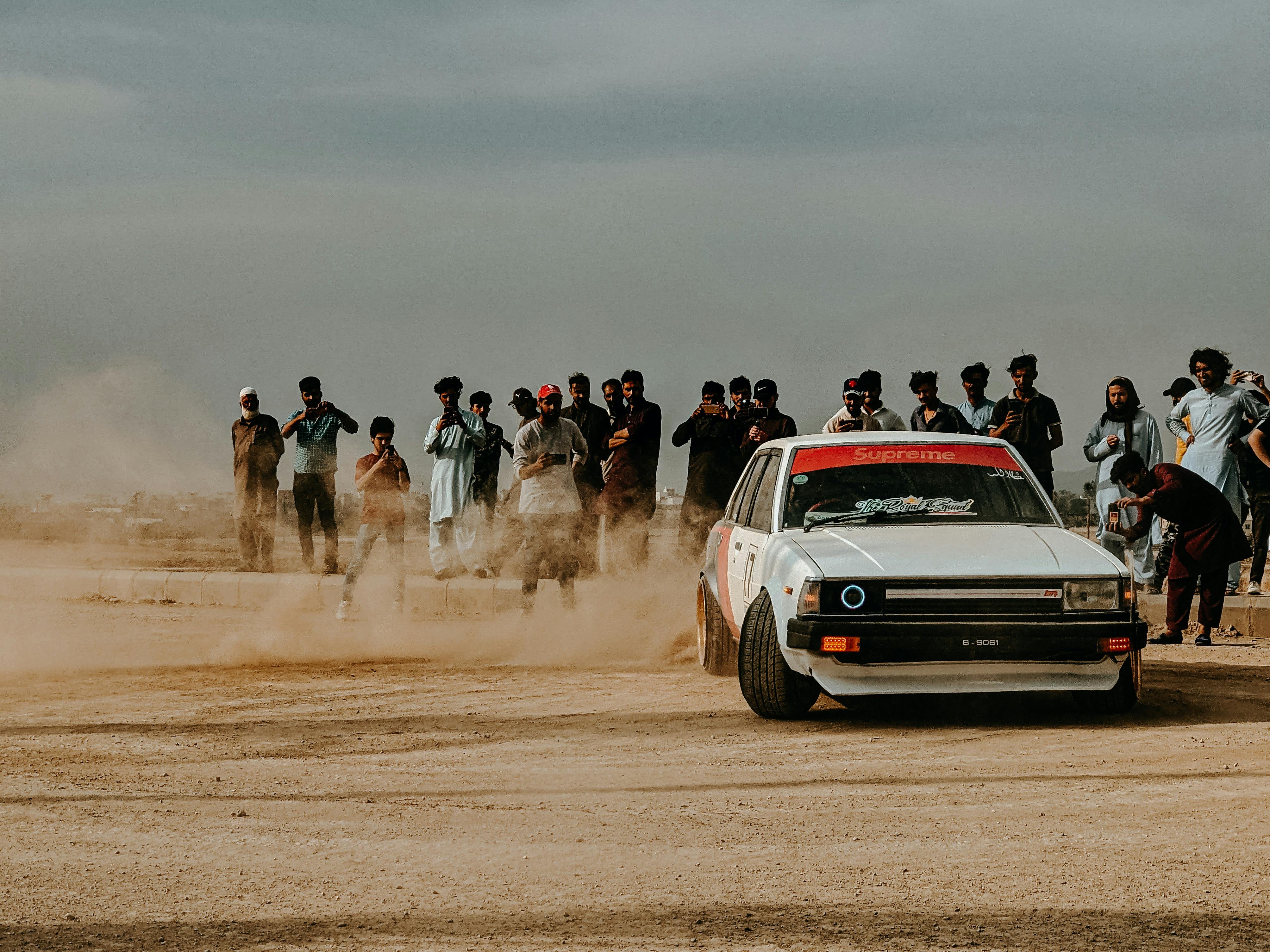 Race Car Drifting on Road through Forest · Free Stock Photo