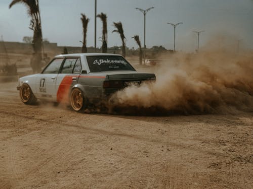 Toyota Corolla E70 Racing in Dust 