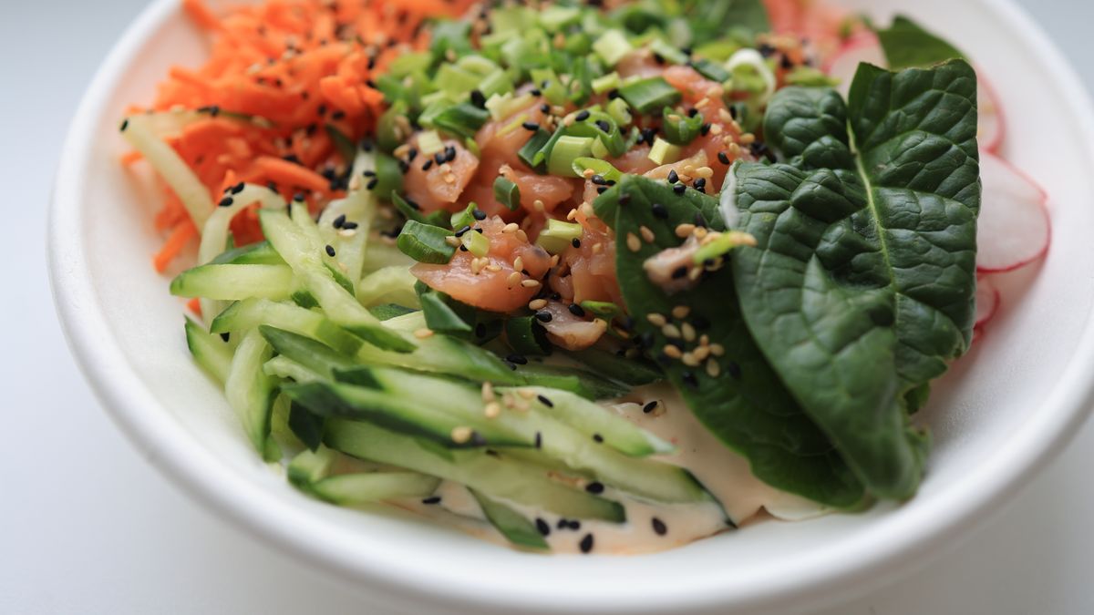 Basmati rice bowl with fresh salmon and spinach