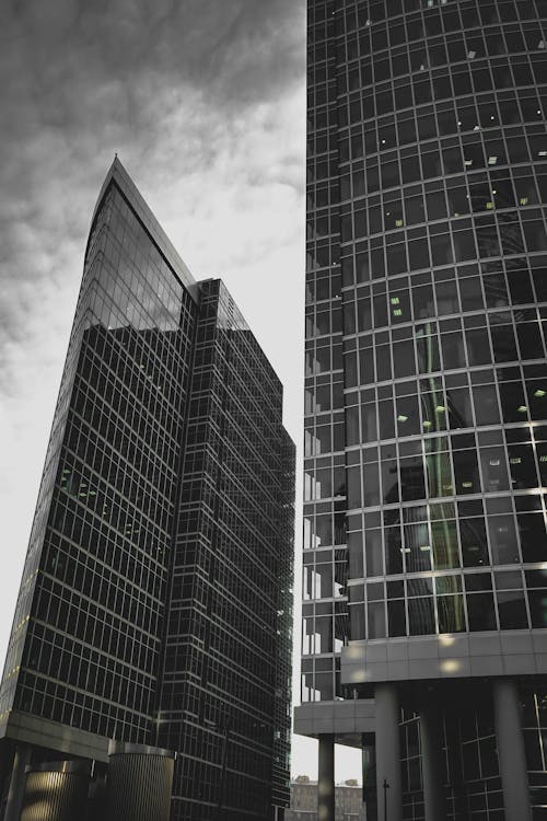 Black and White Photo of Glass Office Buildings