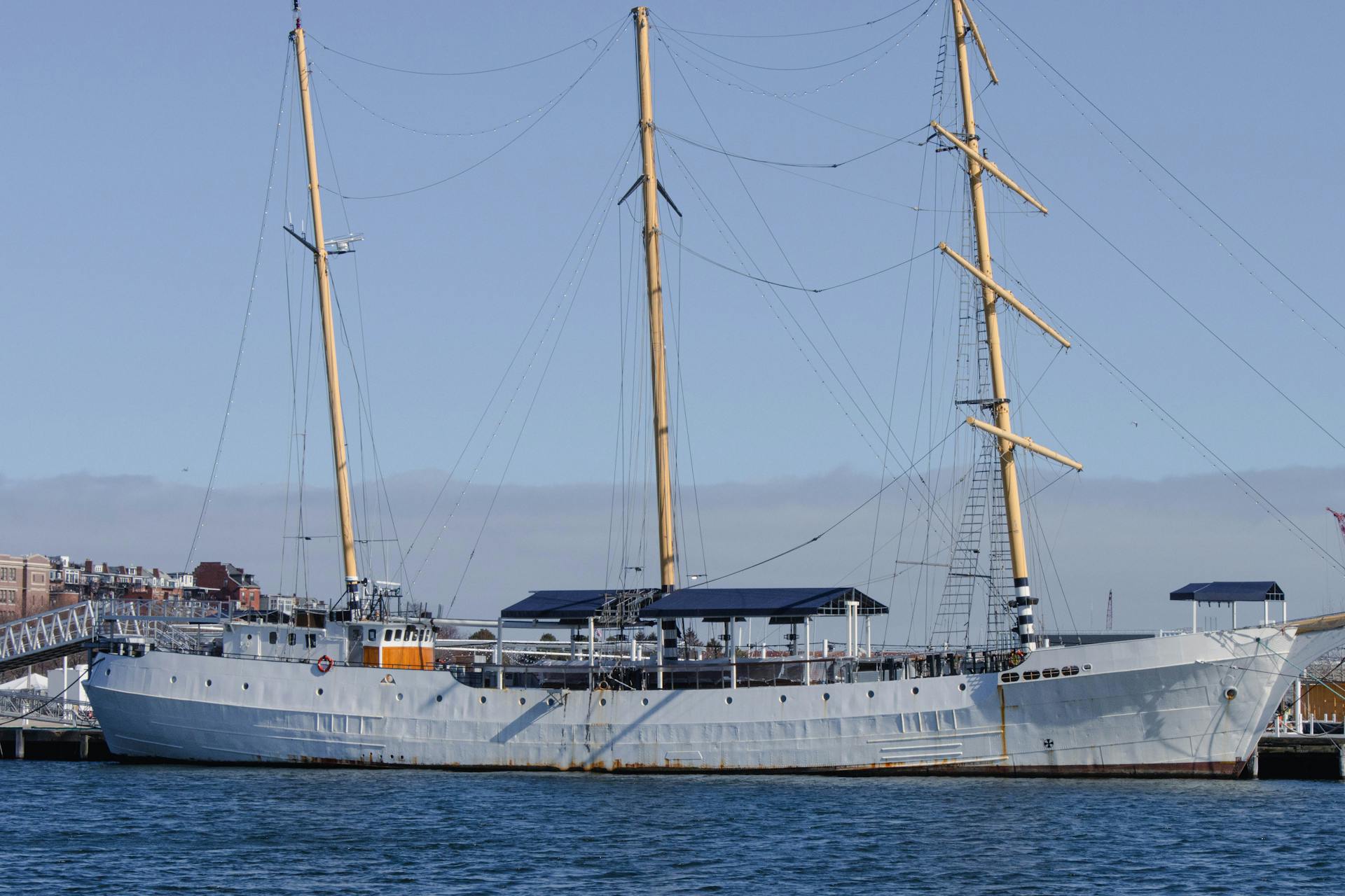 Ship with Masts in Port