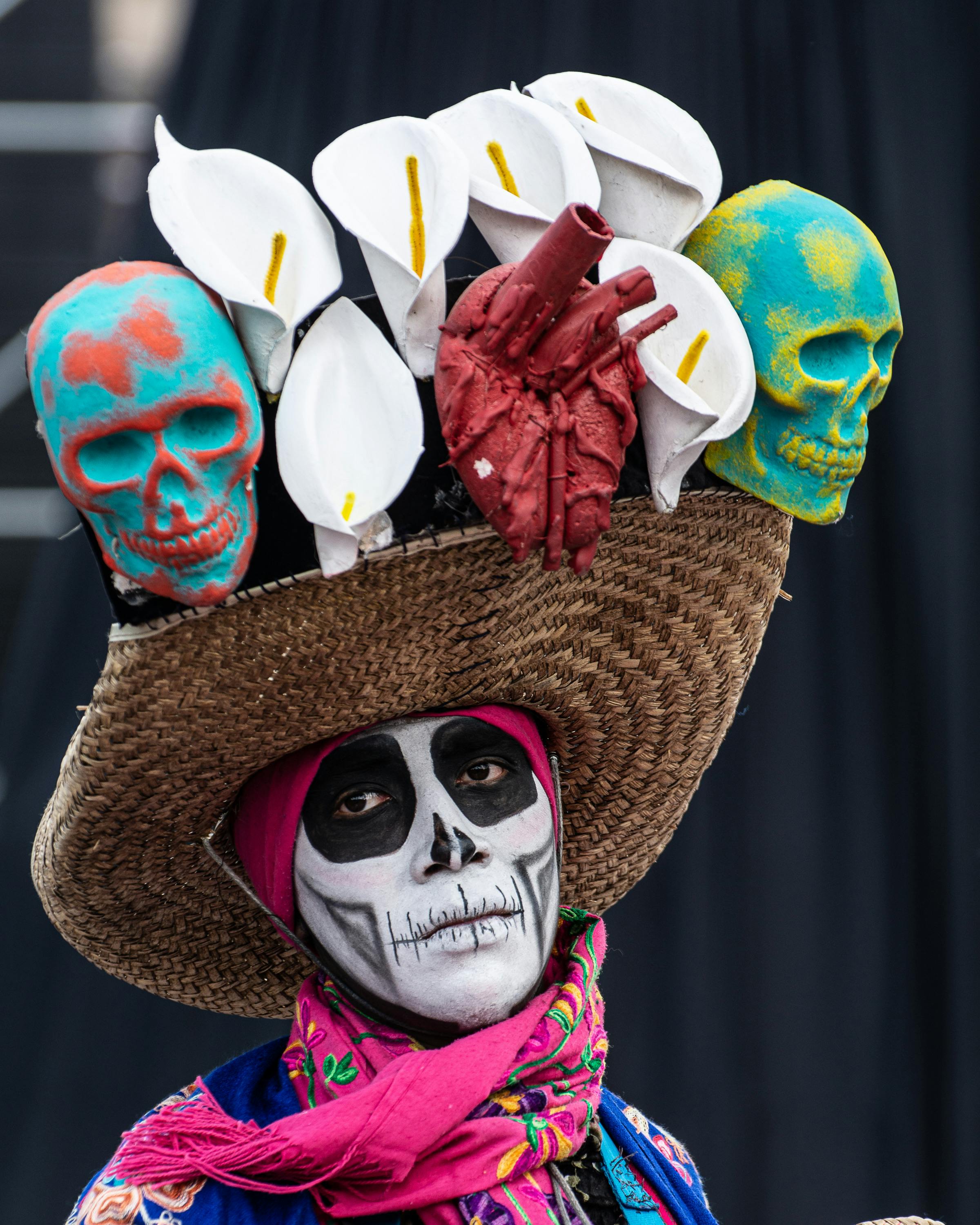 Person With Painted Face Wearing Hat With Skulls · Free Stock Photo