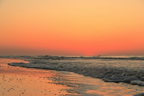 Rough Seascape and Orange Sky