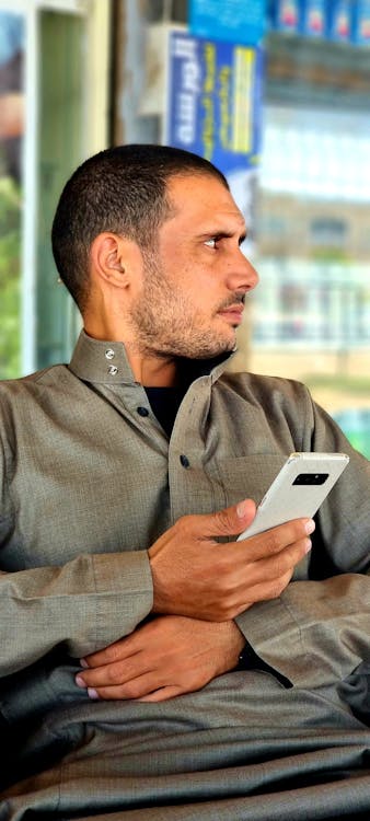 Man Using Phone · Free Stock Photo