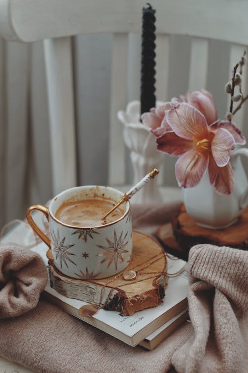 Mug of Coffee on a Wooden Coaster