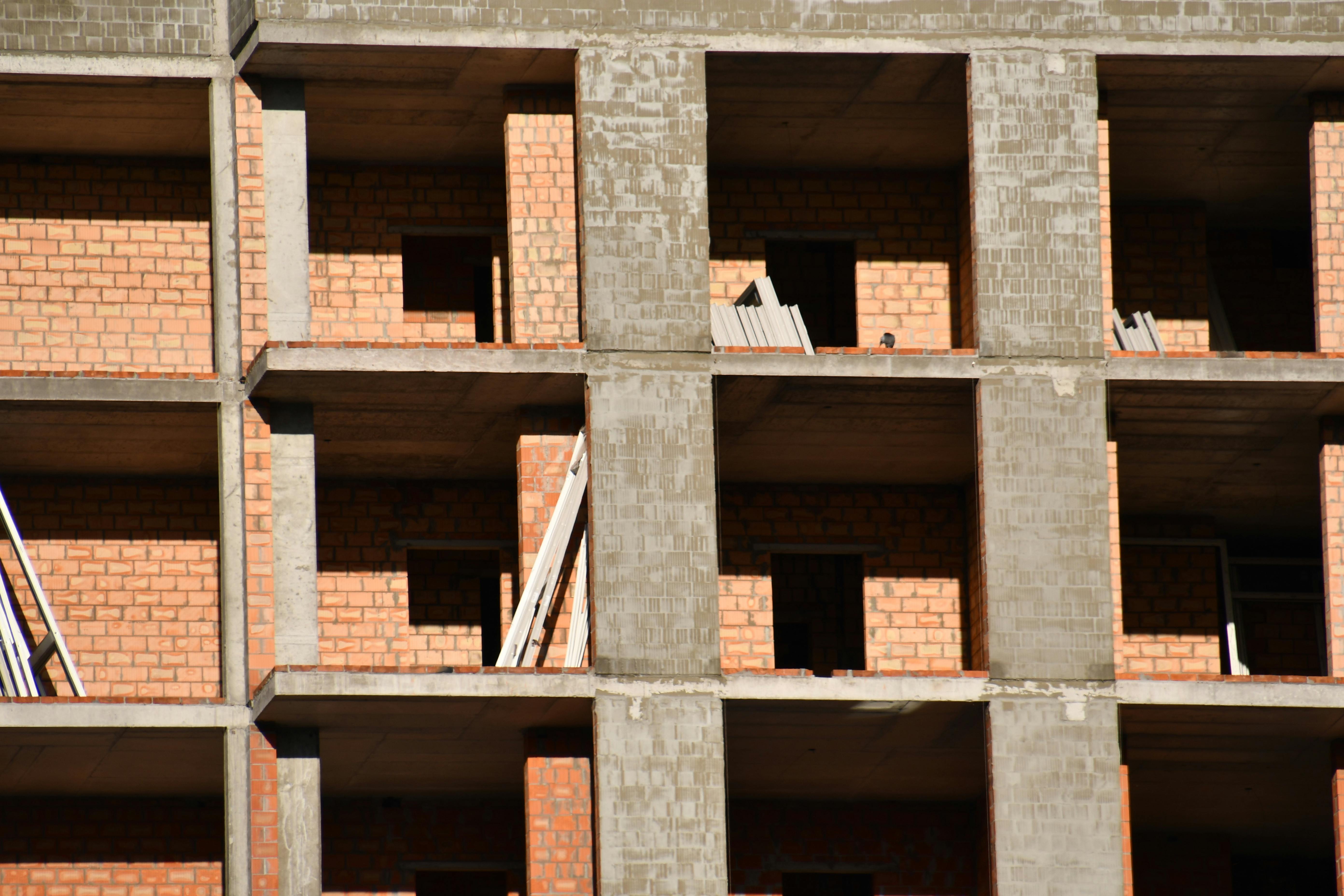 Close-up of brick and cement architecture in a building under construction in Kyiv.