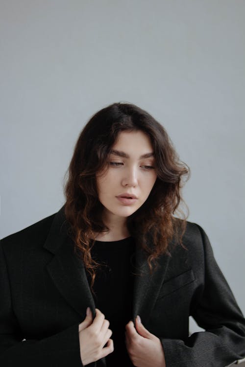 Young Woman Wearing a Black Blazer 