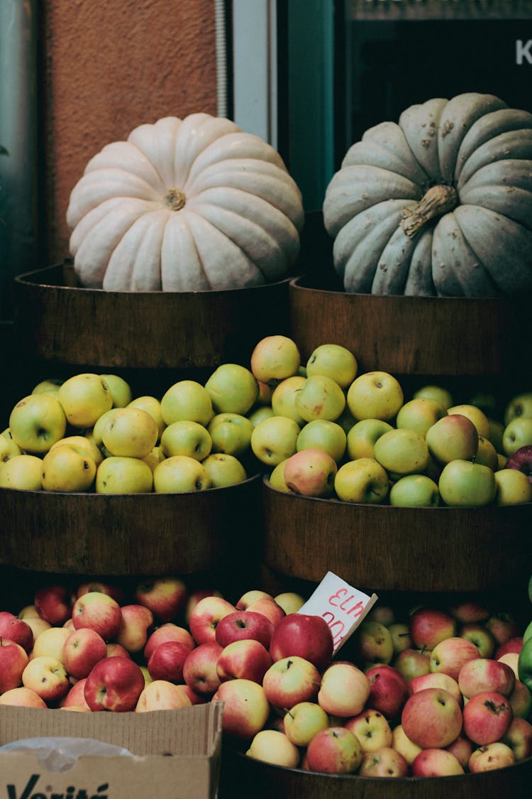 Photo Of Fresh Pumpkins And Apples In Greengrocers